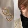 Nieuwe Designer oorbellen Women Gold Metal Ring Fashion Love Heart Earrings Stud vrouwelijke zus bruiloft diamant premium minimalistische oorbellen 18k feest sieraden