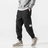 Calça masculina calças comerciais roupas de rua para homens calças de hip-hop calças masculinas calças de harém casual Torno