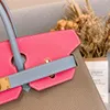 Designer -Tasche Klassische Stil echter Lederhandtasche 30 cm Farbe passende Handtasche Klassische Damen Modeeinkaufstasche Praktische großzügige elegante