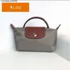 Luksusowa torebka torebka na ramię Crossbody Bag Wysoka mini worka na pierogu wysokiej jakości skórzana torba do makijażu bez jednego ramienia minifk2y