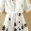 Robes décontractées étés Fashion Floral Printing Elegant Tank Robe White Lace Up Shirt Set Dames Sans manches