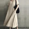 Casual Dresses Women Dress Vintage V Neck Maxi med fickor för fotledslängd Löst passande sommarkläder Korta ärmar Big Hem