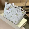 Fashion Vintage Shopping Luggage Designer Print Bags The Travel Holiday Beach 231215 Messenger Femmes Sac Bag Leat Sac à main