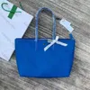 Дизайнерская сумка французская мода местные сумки с большой сумкой для плеча женская сумка с большой способностью горизонтальная сплошная цветная сумка для пассажиров.
