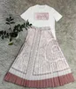 Nowe damskie barokowe drukowane swobodne zestawy z krótkim rękawem sukienka mody projektant T-koszule Top+plisowana spódnica 2-częściowa