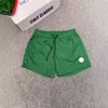 Nieuwe klassieke heren shorts losse zomer strandbroek heren snoepkleur dunne mode sport snel drogen casual 3/4 shorts