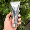 Garrafas de armazenamento 100 ml de plástico prateado tubo macio 100g de loção cosmética Creme de shampoo shampoo squeeze garrafa de alta qualidade