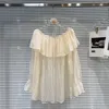 Camicette da donna sexy spallata camicia in chiffon a maniche lunghe per donne 2024 Summer Lace-up Flower perforazione trasparente