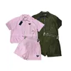 Brande de concepteurs de survêtements pour femmes 2024 printemps / été de la veste à capuche en nylon de décoration de triangle métal / d'été