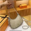 2024 Nouvelle femme Crescent Designer Fashion Underarm Underarm Simple Boupéter Versatile Casual Sac