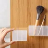 Förvaringslådor läppstiftlåda tre-rutnät väggmonterade hålfria små föremål ögonbryns Clipper sax Penna Brush Makeup Organiser