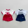 Shorts 2024 Summer New Baby Loose Shorts Baby Boys and Girls Letter Printed Casual Shorts Cotton Preschool Fashion Edition Sports Shorts d240510