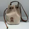 Bolsa de designer de luxo Mulheres bolsas de lona Bolsas de ombro de lona Moda miui bolsa bordada bordada bagbag saco de cordão de traje bolsas crossbody