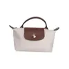 Les magasins de sacs de créateurs sont à 95% de réduction sur la version haute du dragon français Xiang Mini Punching avec bandoulière Dumpling Mobile Phone Mobile Wallet One Crossbody Handbag3Wil