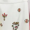 Arbetsklänningar Kvinnor Loose 2024 European Fashion Heavy Industry Nail Bead Inlaid Diamond Short Top Pullovers Half kjol Set Two Piece X520