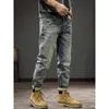 Jeans masculinos Spring e outono Tendências com a marca de moda jeans Stretch Stretch slim haren cônico calças
