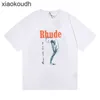 Rhude High End Designer T-Shirts, Gold Mens ile Modaya Modaya Uygun Yuvarlak Yuvarlak Boyun Pamuklu Kısa Kollu Tişört 1: 1 Orijinal Etiket