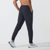 Herr jogger långa byxor sport yoga outfit snabb torr dragkammare gym fickor sweatpants byxor mens avslappnad elastisk midje fitness 2024 ny het