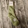 Chaussettes masculines poutres léger luxe couleur unie en caoutchouc haut en caoutchouc joint skateboard à tube haut coton chaussettes pour hommes et femmes serviette au fond des chaussettes INS humides 9x69