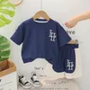 Set di abbigliamento per bambini estate 2024 waffle corean waffle lettera o-scorsa maglietta a maniche corte top e pantaloncini boutique per bambini