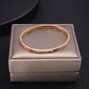 Bracciale esclusivo dell'amante per mostrare amore Bracciale alla moda e di lusso da donna in oro 18K con carrello comune e braccialetto di famiglia C