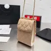 Sac à bandoulière de créateur de cuir de luxe avec crampon en réseau en diamant classique et sac de téléphone à balle dorée new laser mini Fash Woig pour femmes