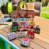 Designer Keychains woman Accessories Mini Cute Creative small house H bag Package car key rings hanging decoration headphones bag mouth red envelope her01