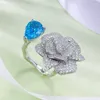 Bague de cluster de cluster Spring Camellia Ring 925 argent incrusté 7 10 fleur bleu de mer coupée petite et à la mode polyvalente simple