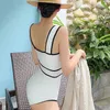 Kadın Mayo Bayan Yüzme Takımı Tek Parça Geniş Strap Monokini Yaz Kore tarzı bikini, göbek gizli yüzmek