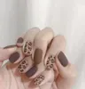 24pcsset Leopard Print Fałszywe paznokcie sztuczne wskazówki Pełna okładka do dekoracji sztylet design prasa na paznokcie sztuka fałszywa przedłużenie końcówki 6619312