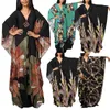 Kimonos Femmes décontractées d'impression de fleurs Cover-up de bikini élégant cardigan à manches longues plage en vrac Sexy Covers Party Kaftan