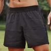 2024 Designer Men Yoga Sports korta snabba torr shorts med bakficka mobiltelefon casual löpande gym jogger pant ll