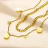 Set di gioielli Bracciale oro in oro 18K a bordo a 2 strati di lussuoso designer di marchi di lusso Pendenti collane in acciaio inossidabile Lettera inossidabile Collana Gioieria Accessori per gioielli
