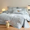 Ensemble de literie en 4 pièces luxueuse en coton pur avec housse de couette brodée pour chambre ou chambre d'hôtes