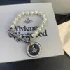 Очарование Westwood Saturn Pearl Round Bracelet Bracelet Женский персонализированный дизайн гвоздь