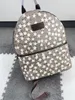 Backpack de designer Backpack estilo clássico bordado gletter bolsas