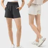 L-072 Pantalones de yoga Fitness para mujeres Shorts de deportes al aire libre de tres cuartos escasas de yoga livianas para mujeres