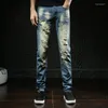 Jeans pour hommes rétro Blue Blue Ripped Trendy Stretch Denim Pantalon Pantalon masculin polyvalent de haute qualité