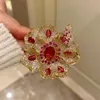 Retro Snowflake Rose Brooch Womens coloré Luxury Cumbic Zirconia Cloth accessoires Bijoux épingles de bijoux Cadeaux de mariage 240430