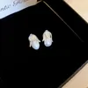 Boucles d'oreilles à goujons fleur de bourgeon perlé pour femmes bijoux de mode à tempérament sucré français