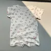 Ensemble de vêtements Ins Summer Children Mainswear Hort Sheeve Turnits Boy Girl Baby Floral Print Tops Shorts 2pcs T-shirt décontracté en coton