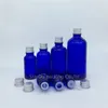 Bouteilles de rangement 5 ml 10 ml 15 ml 20ml 30 ml 50 ml Huile de bouteille en verre bleu 100 ml avec parfum de couverture en aluminium 200pcs / lot