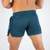 2024 Fitness Sports Shorts Man Летние спортивные залы тренировки мужские дышащие сетчатые шорты Quick Dry Beach Short Pants Men Sportswear 240508