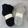 Chaussettes masculines Produits universels japonais anti-tissus épaisses épaisses chaussettes de couleur solide de longueur moyenne Cityboy Coton chaussettes SRCB