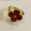 2024 Classic Four Leaf Grass High Edition Lucky Clover Ring feminino S925 Prata Natural Fritillaria Red Chalcedony Full Diamond Ring Color Preservation