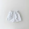 Shorts bébé et filles shorts d'été solides élastiques de la taille de la taille de la taille de la maternelle à la maternelle nouveau-nés décontractés de sports de sport D240510