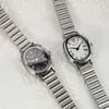Нарученные часы овальные женщины Quartz Watch Roman Dial Ladies Ladies Luxury Gift Watch. Повседневные простые наручные часы из нержавеющей стали.