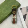 Tasarımcılar Marka Keychain Anahtar Zinciri Erkekler Lüks Araba Knah Derecilik Moda Arı Toka Anahtarları El Yapımı Deri Çantalar Kolye Aksesuarları YB34