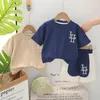 Set di abbigliamento per bambini estate 2024 waffle corean waffle lettera o-scorsa maglietta a maniche corte top e pantaloncini boutique per bambini