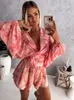 Sexig Deep V Neck Jumpsuit för kvinnor Summer Casual Boho Beach Vacation Outfit Fashion Print Lantern Sleeve Rompers Shorts 240508